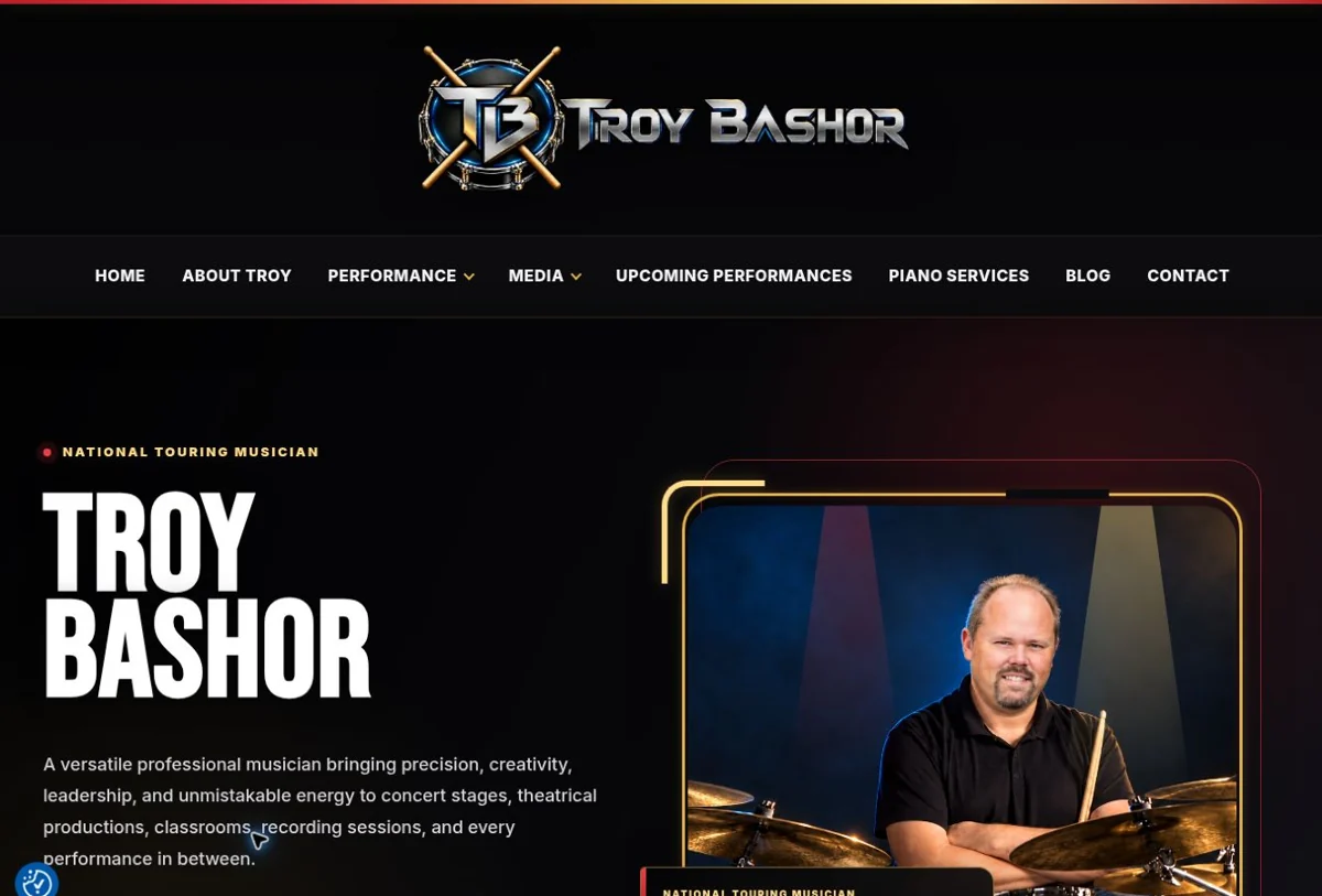 Troy Bashor musician website with a dramatic dark design and artist portrait